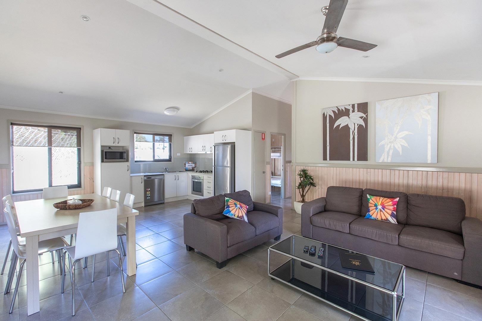 The spacious living room of the three bedroom cabin at Ocean Beach Tourist Park.