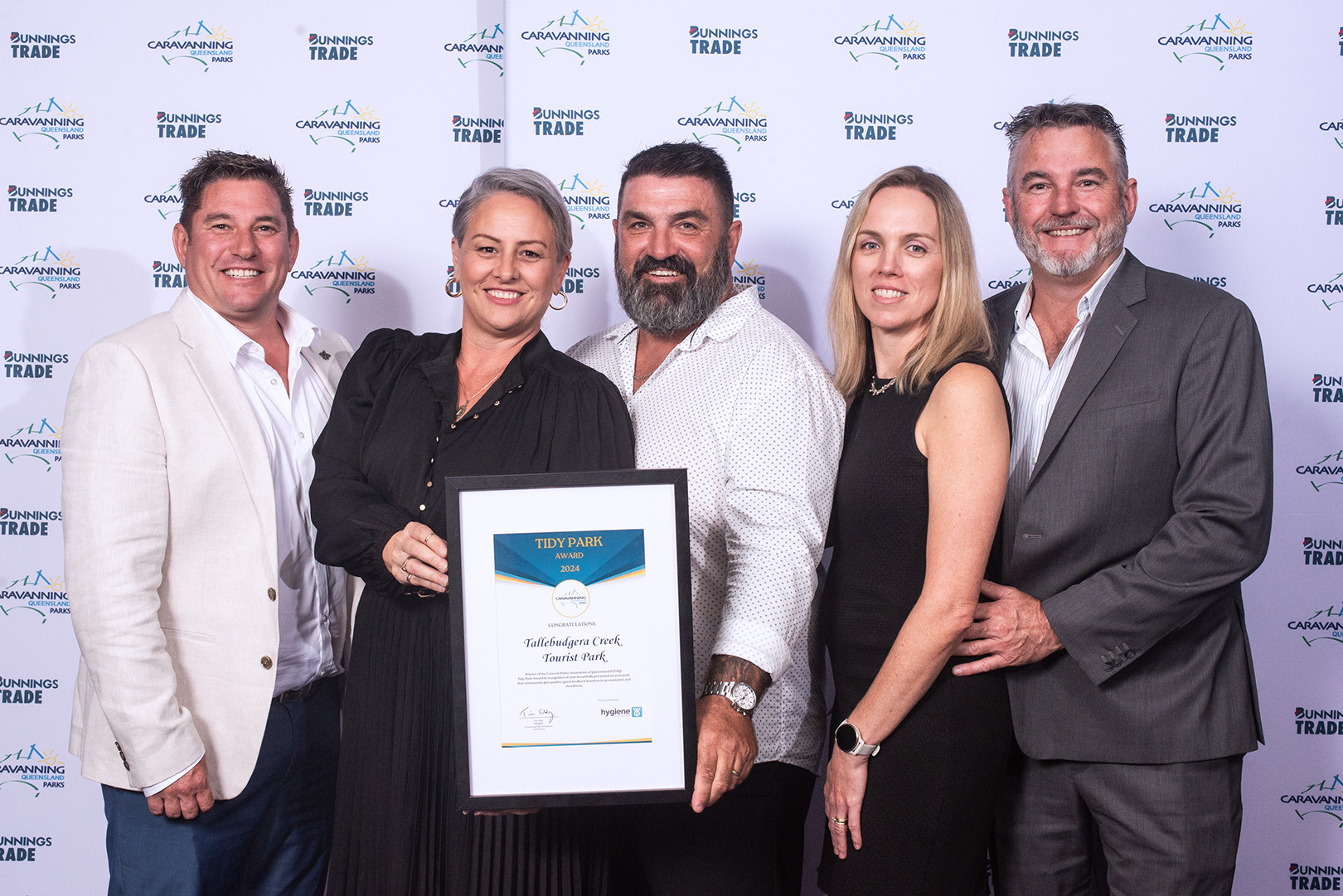 Park Managers, Tim and Tanya Pearson, accepting their Tidy Park Award at the 2024 CPAQ Awards alongside the Contract Managers, Scott, Adrian, and Casey Easdown..