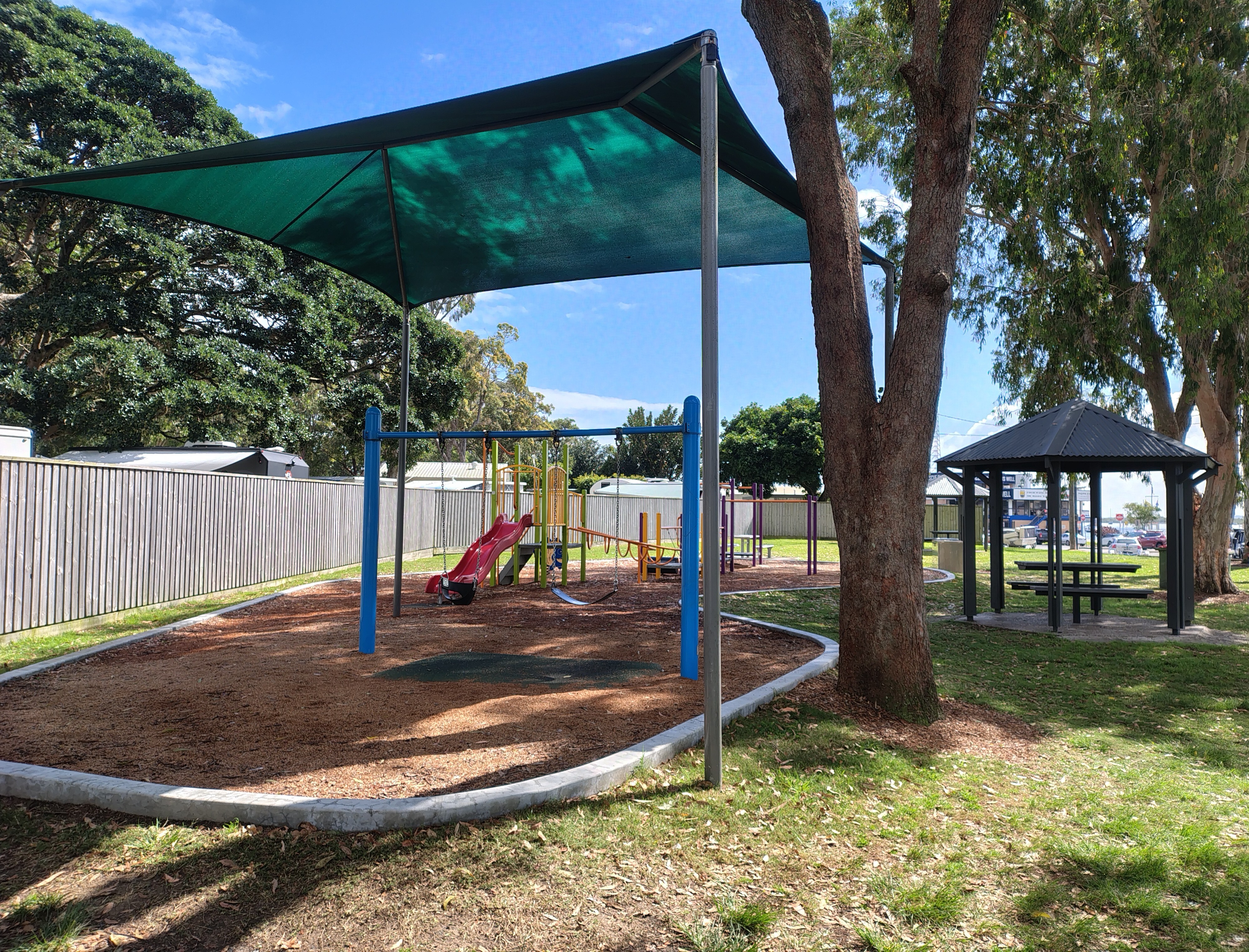 Playground: The playground is conveniently located just outside the park’s boundary, across from the Jacobs Well Hotel.