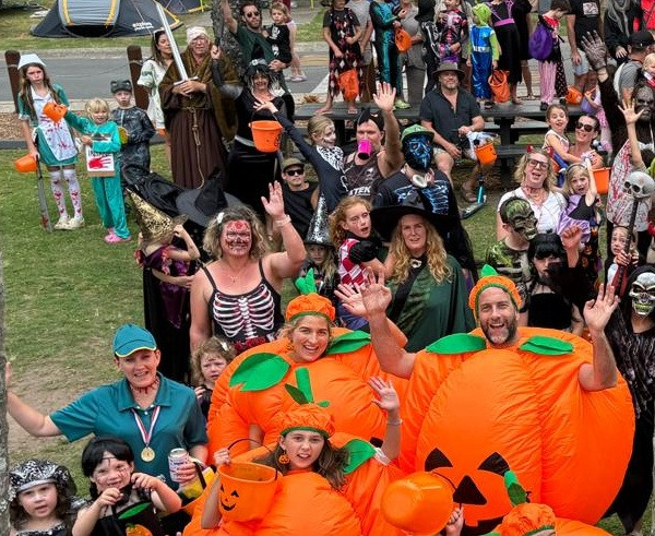 Park guests dressed in their costumes